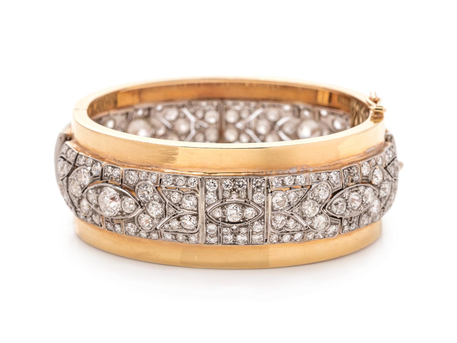 A Platinum, Yellow Gold and Diamond Bangle Bracelet,