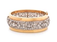 A Platinum, Yellow Gold and Diamond Bangle Bracelet,