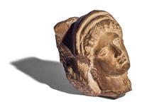 A Greek Terracotta Female Head