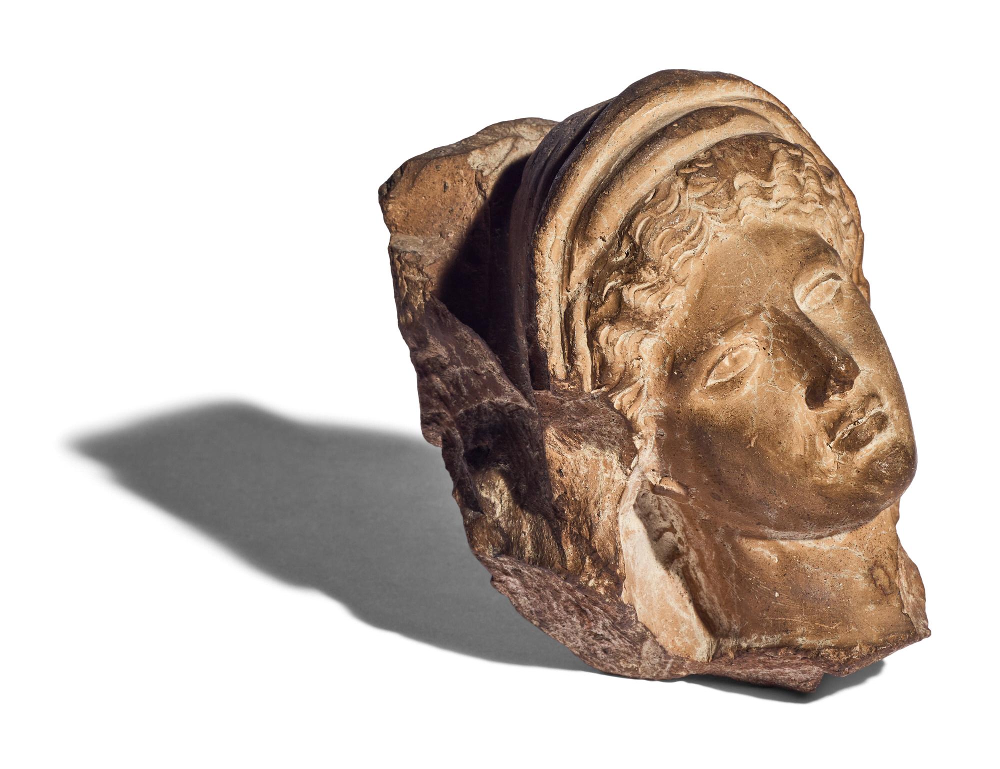 A Greek Terracotta Female Head