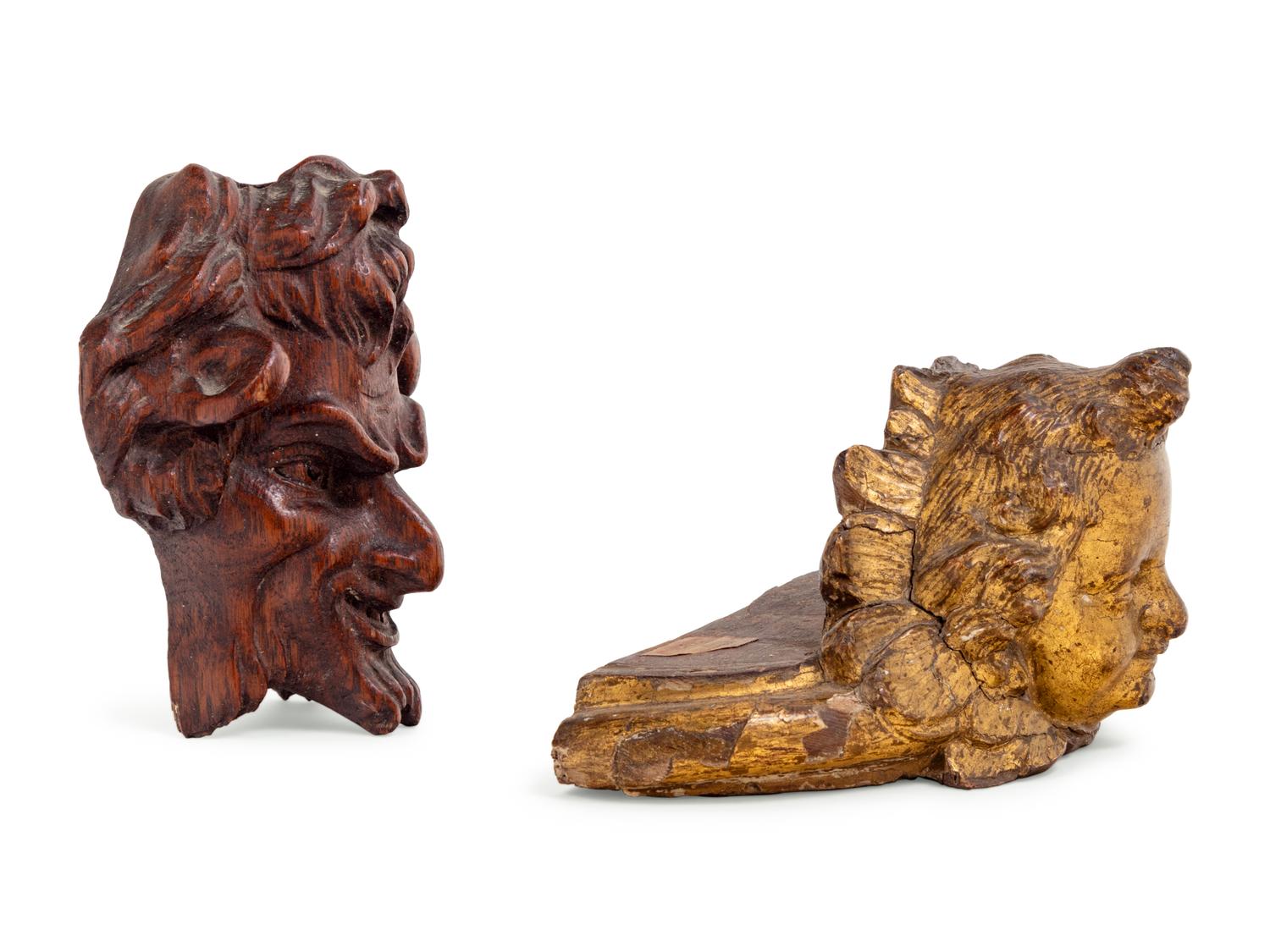 A Carved Oak Devil's Mask with a Giltwood Cherub Mask
