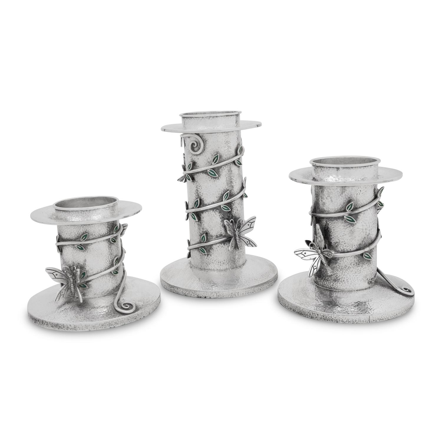 A Set of Three Mexican Silver Graduated Candlesticks