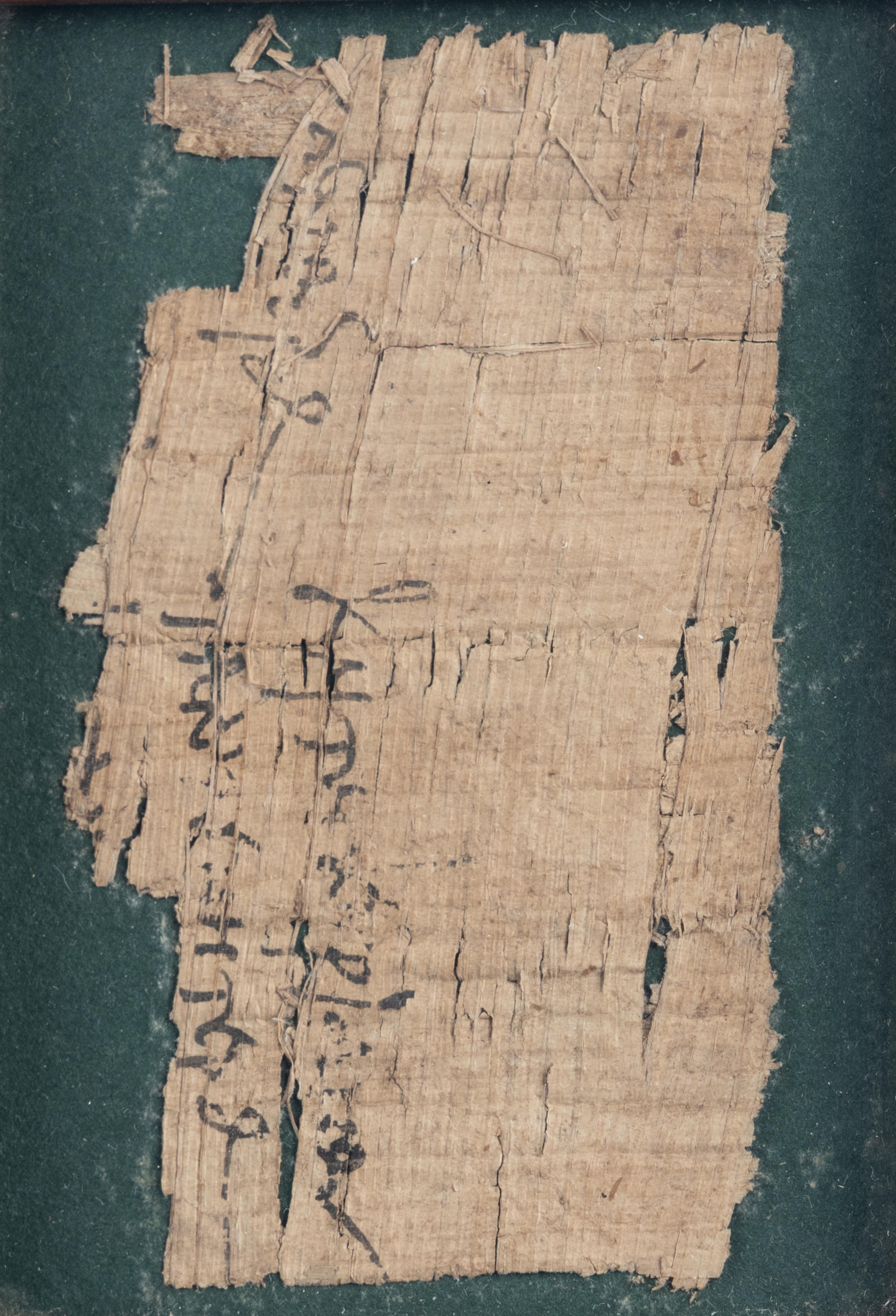 Two Egyptian Papyrus and Textile Fragments