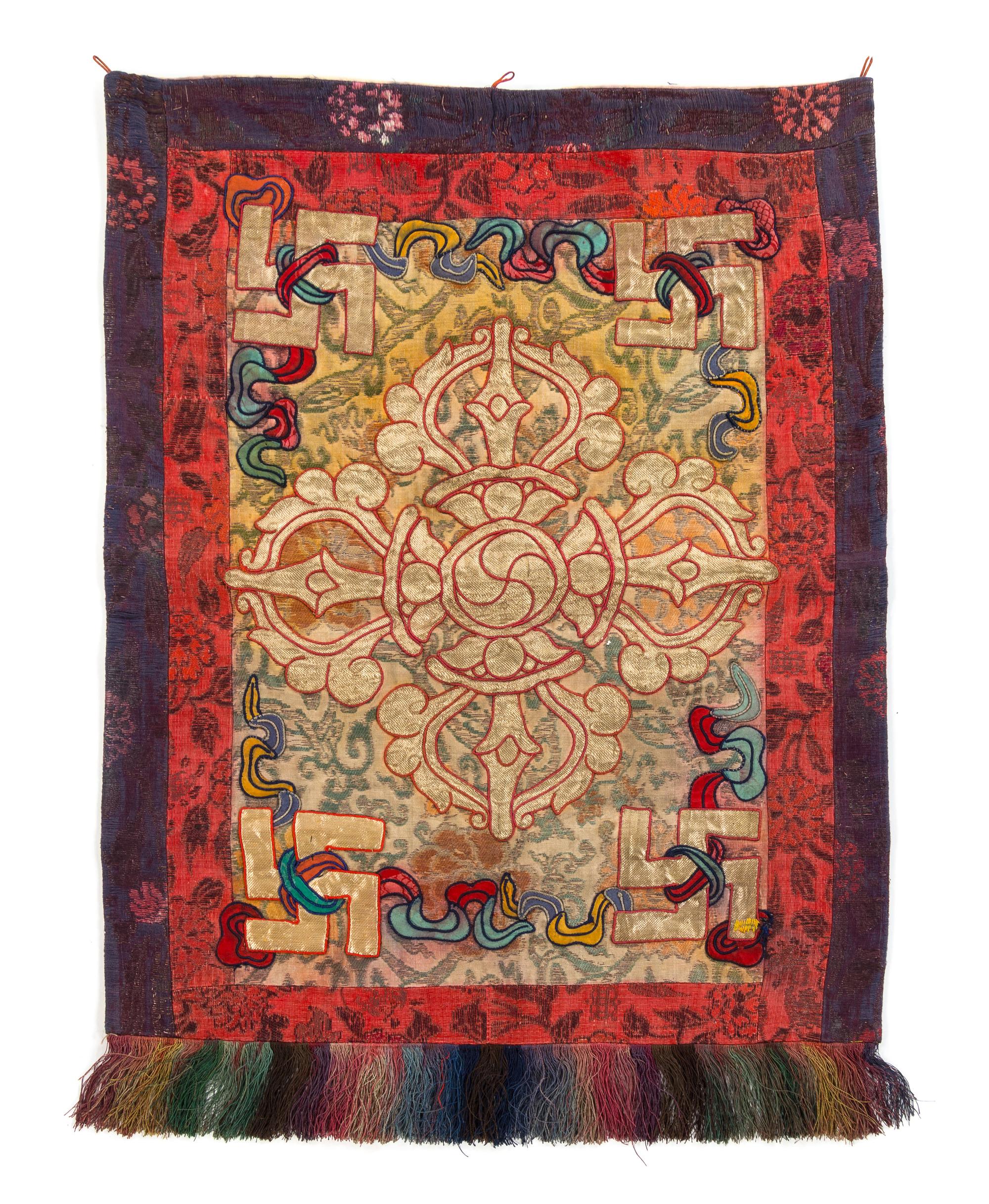 A Small Tibetan Brocade Hanging Panel 18TH/19TH CENTURY 18 3/4 x 13 inches. — 18TH/19TH CENTURY
