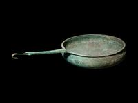 A South Italian Bronze Patera with Strap Handle