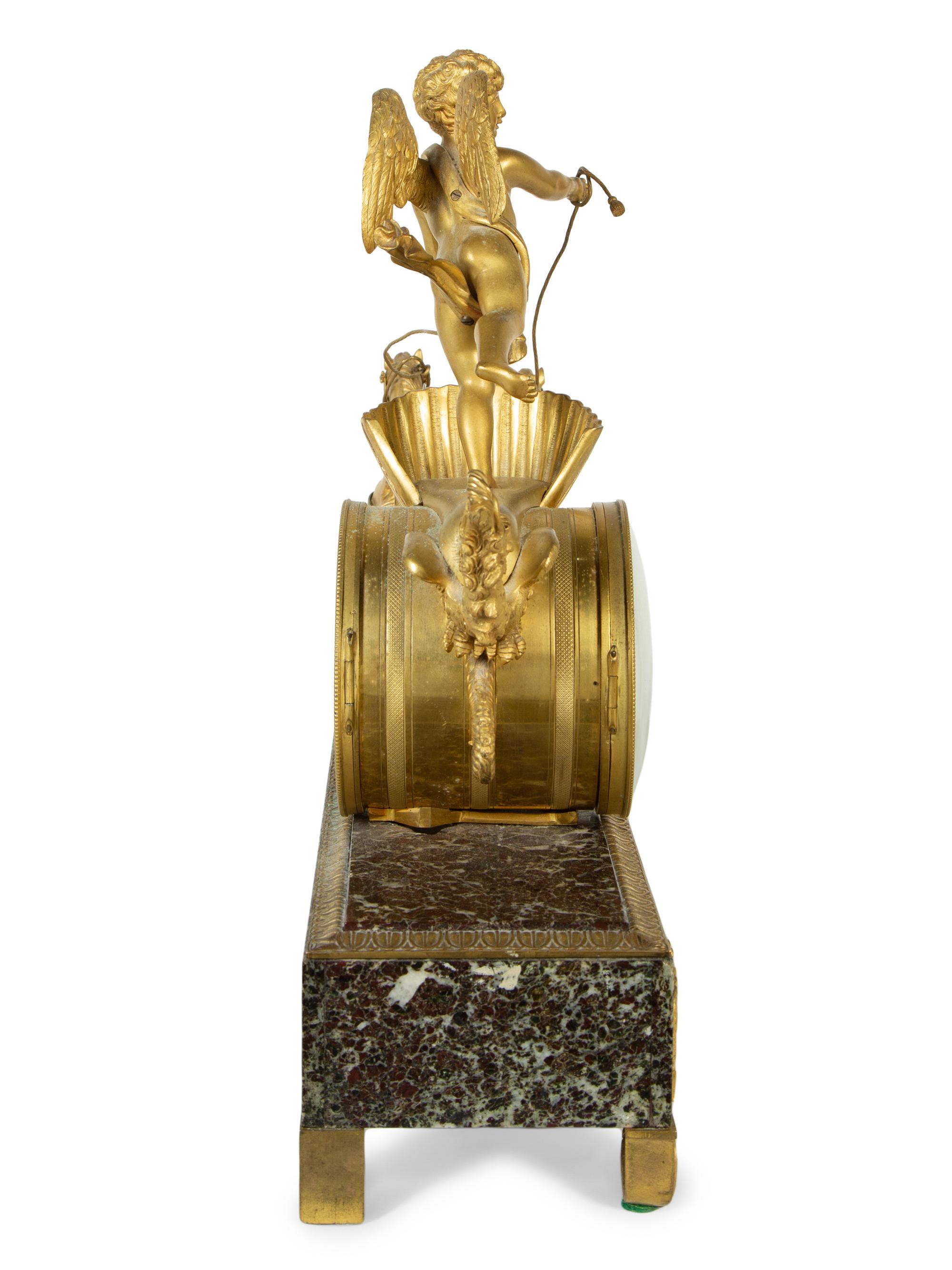 A French Gilt Bronze and Marble Mantel Clock