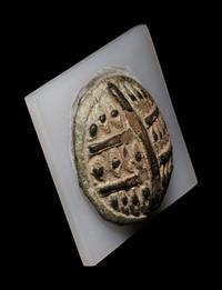An Egyptian Faience Eye Plaque