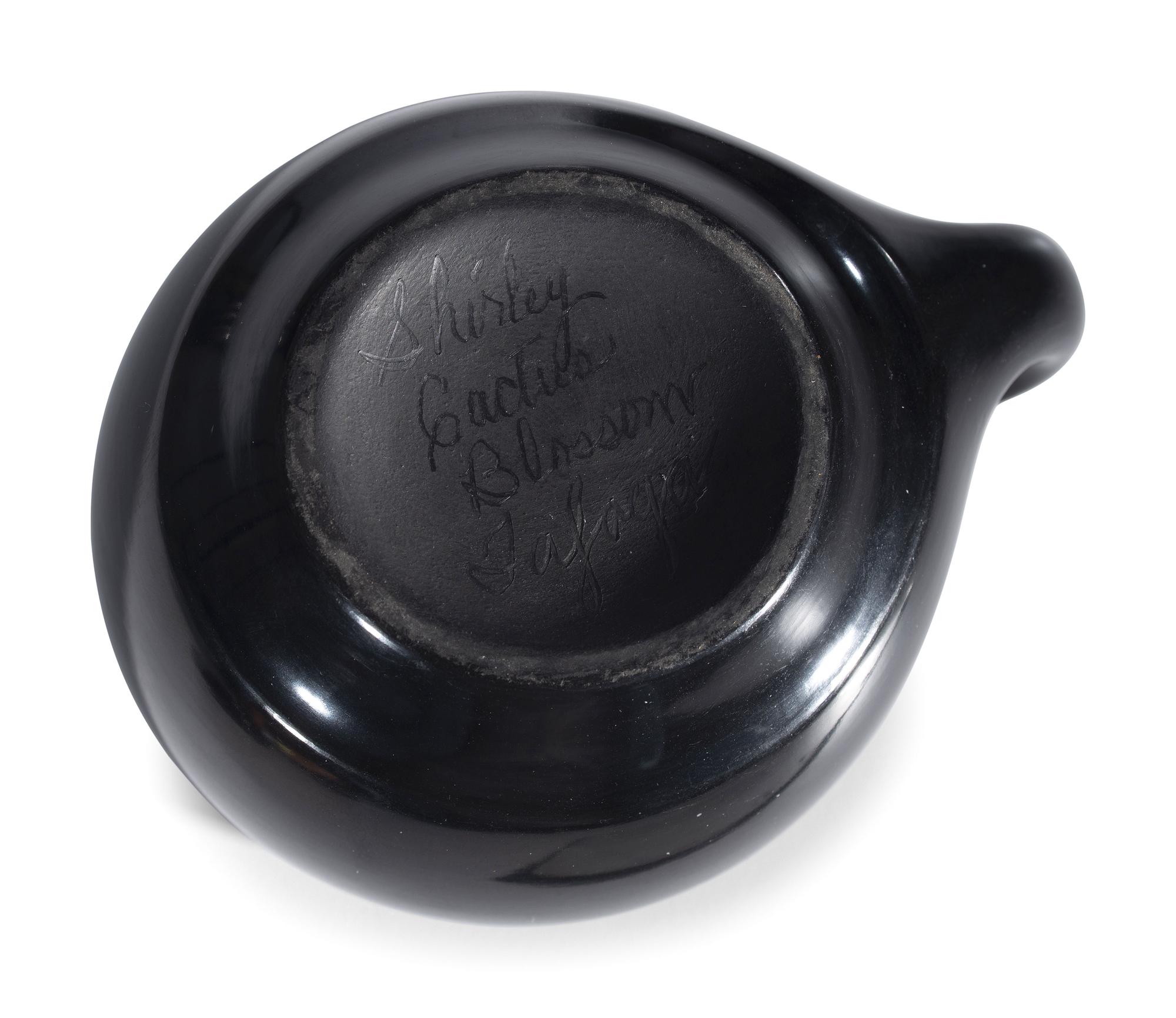 Blackware Pottery Cup and Saucer