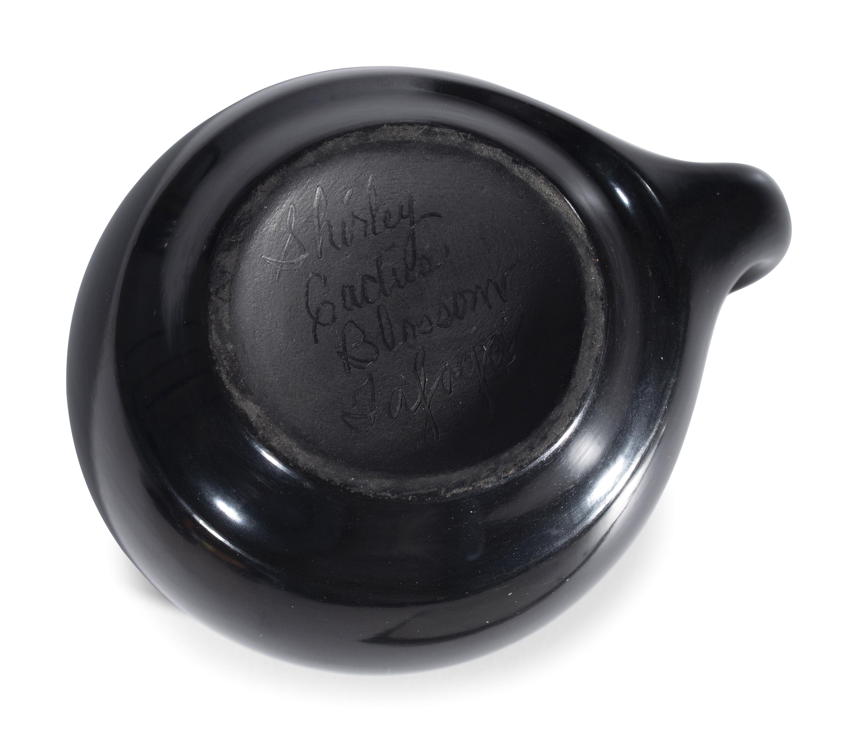 Blackware Pottery Cup and Saucer