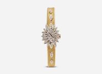 An 18K Yellow Gold and Diamond Hidden Dial Ladies Chopard Watch