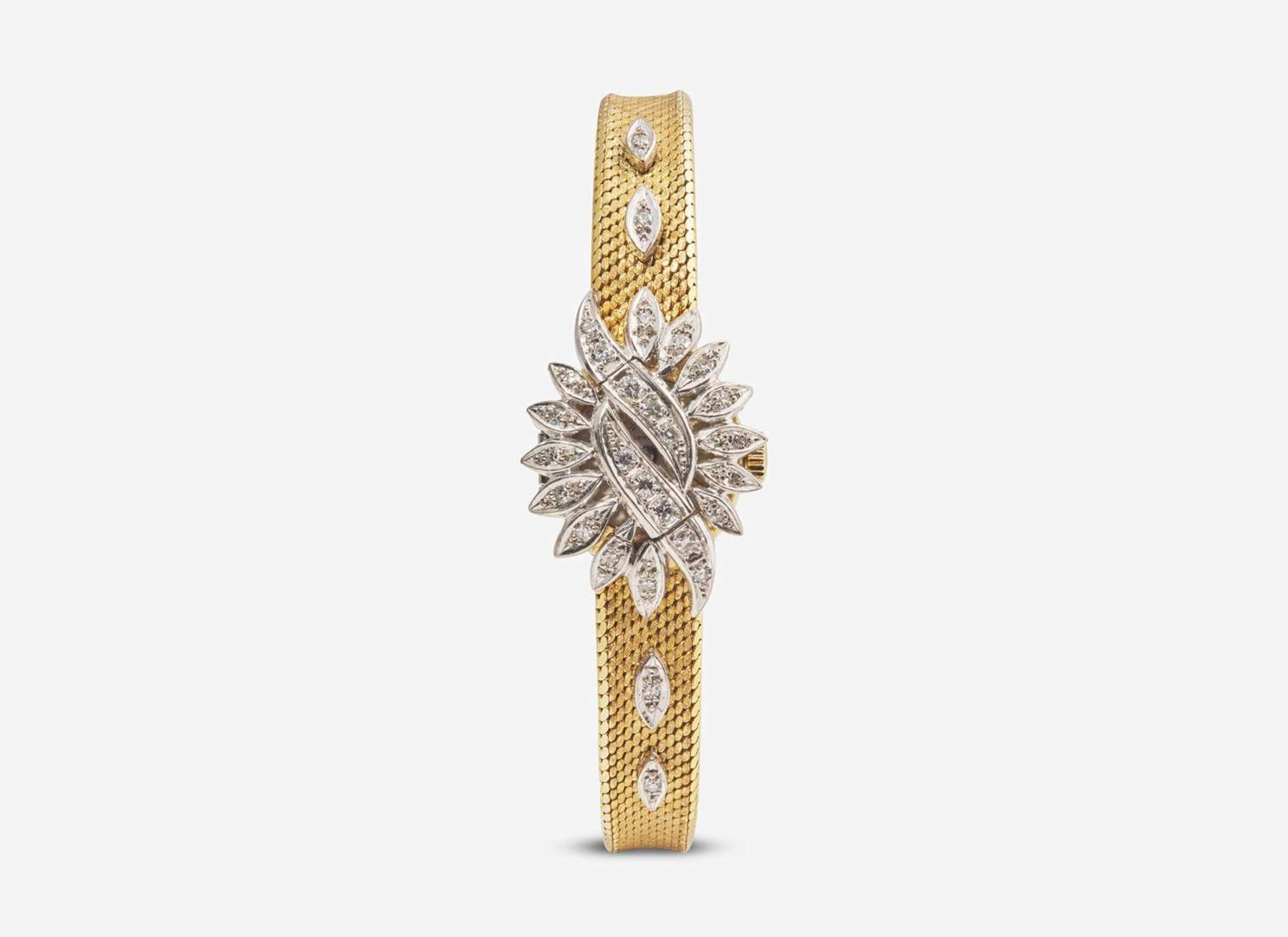 An 18K Yellow Gold and Diamond Hidden Dial Ladies Chopard Watch