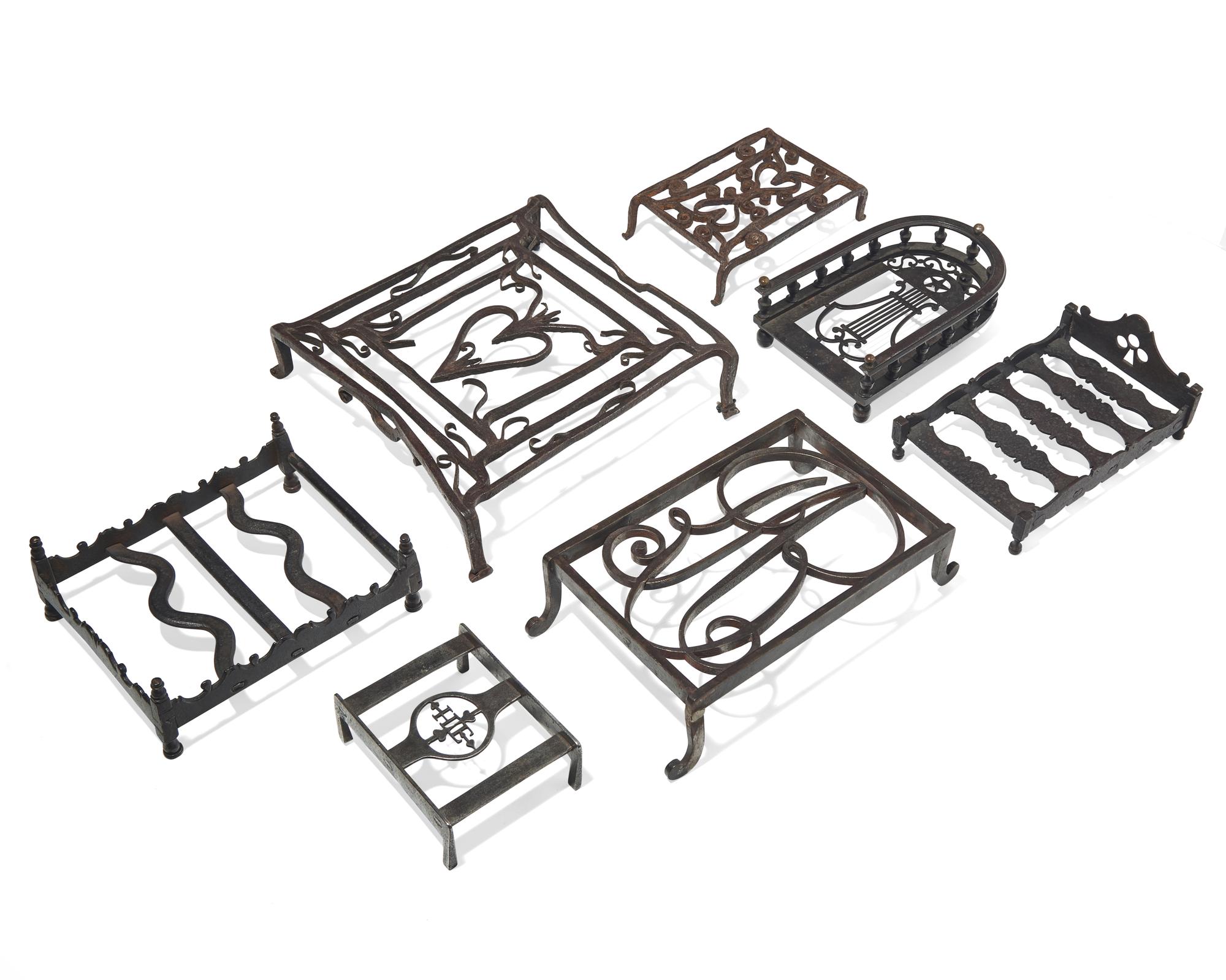 A Group of Seven Wrought Iron Trivets or Stands, French, 18th / Early 19th Century