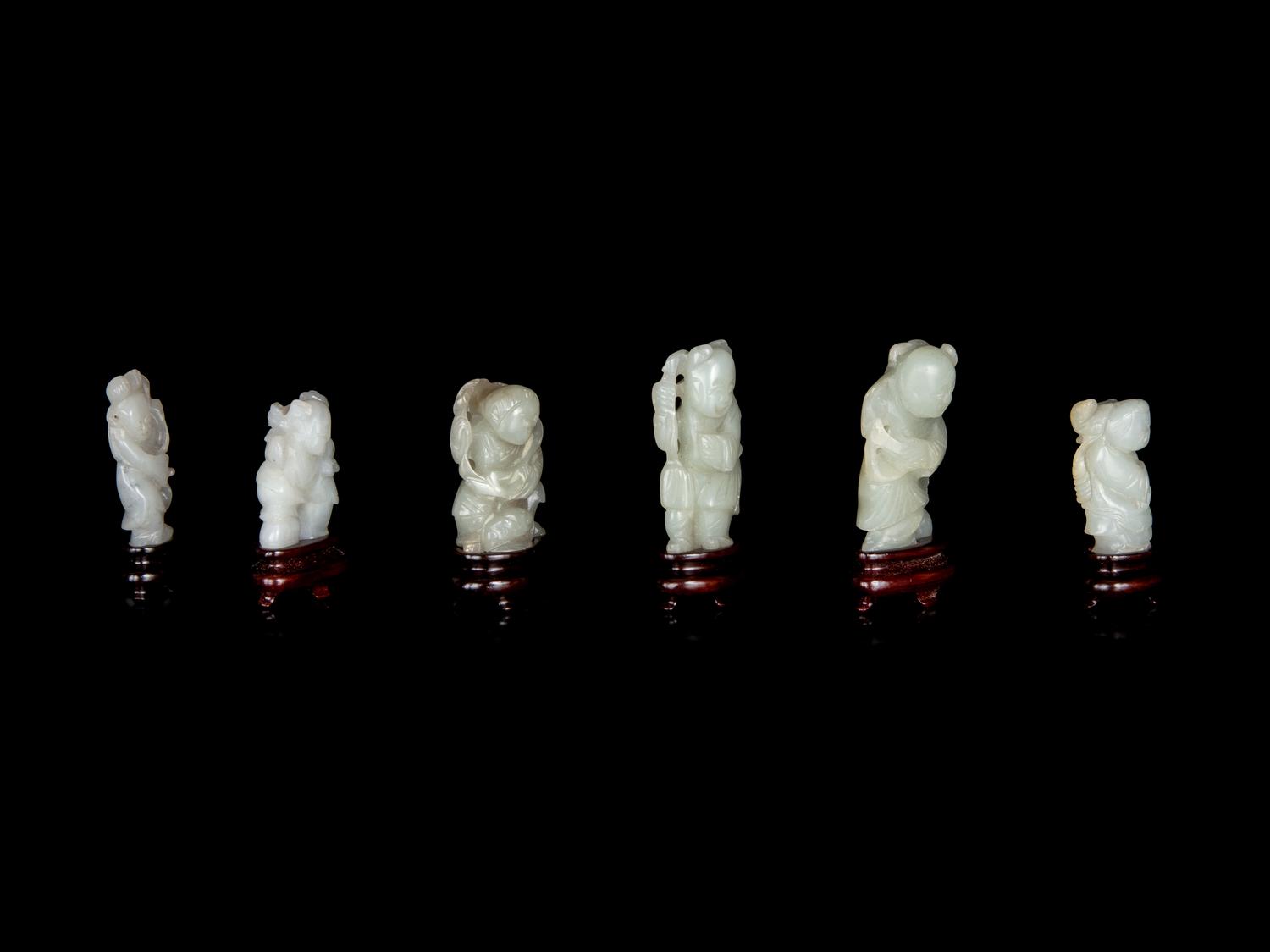 Six Chinese Carved Celadon Jade Figures of Boys