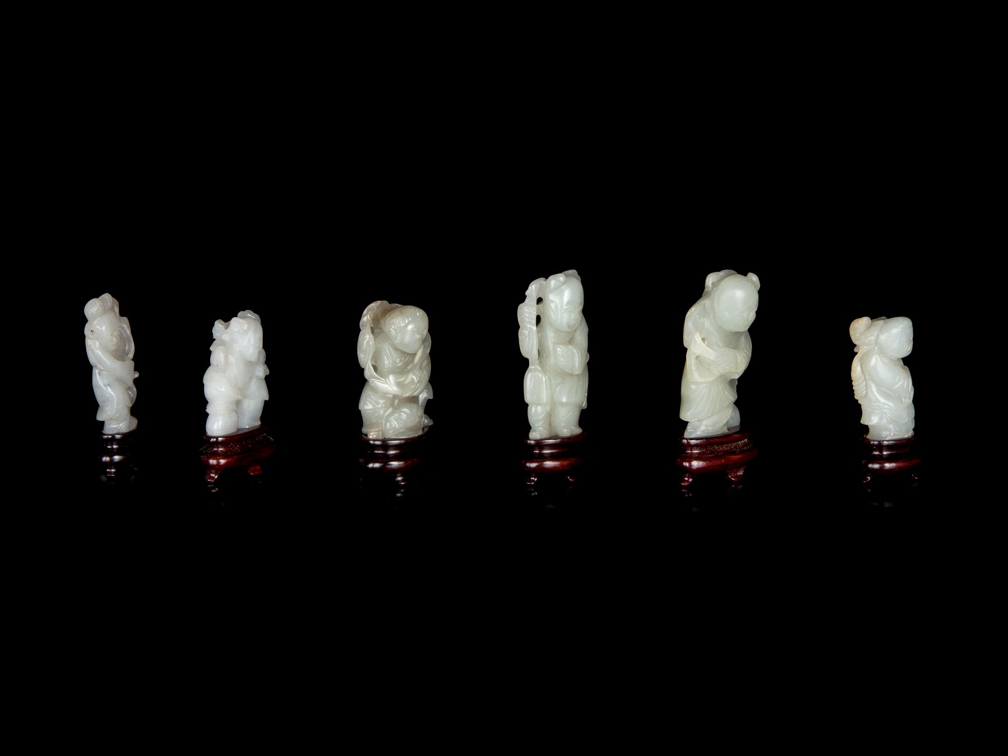 Six Chinese Carved Celadon Jade Figures of Boys