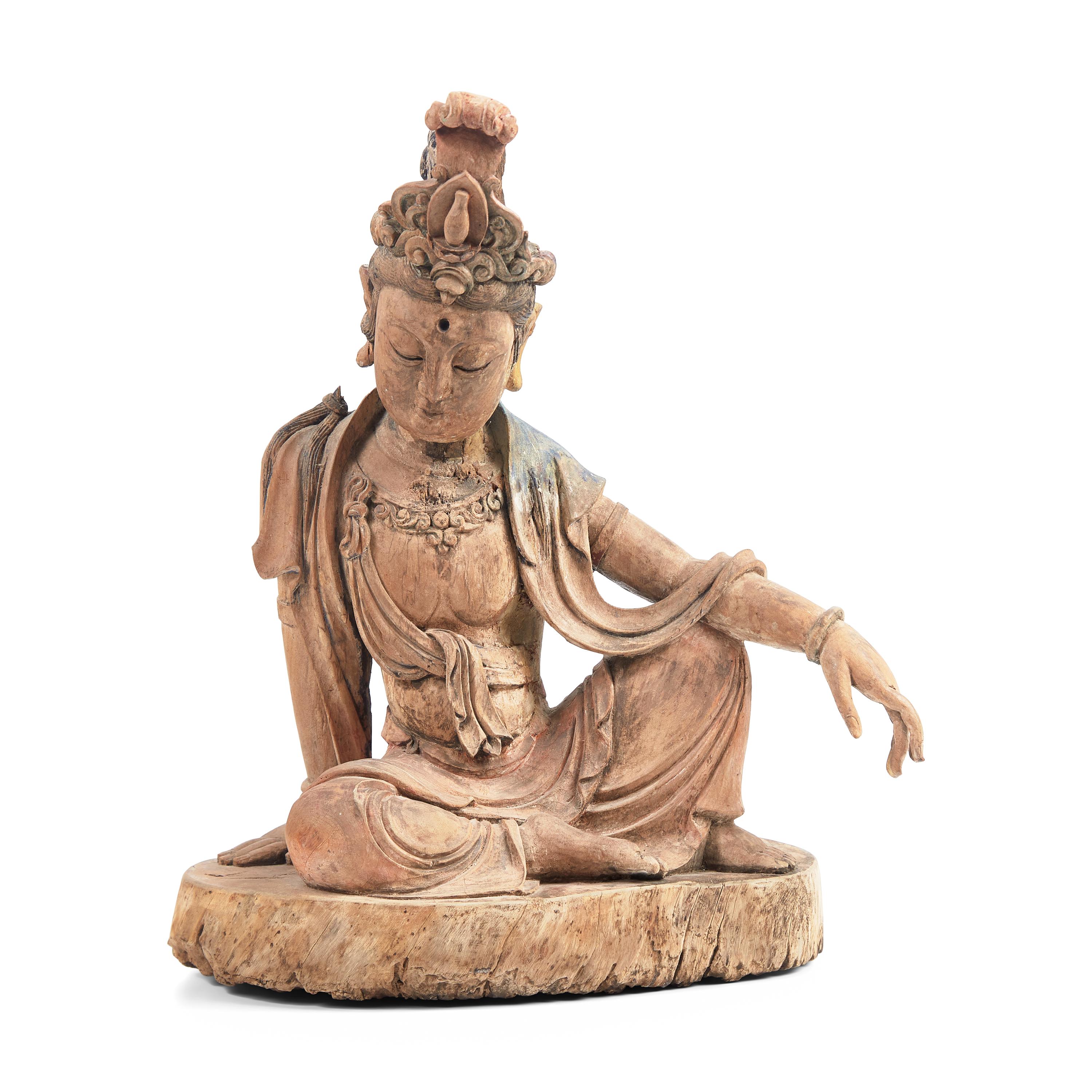A Chinese Carved and Painted Wood Figure of Guanyin, Ming Dynasty or Earlier 明或更早 木雕彩繪水月觀音