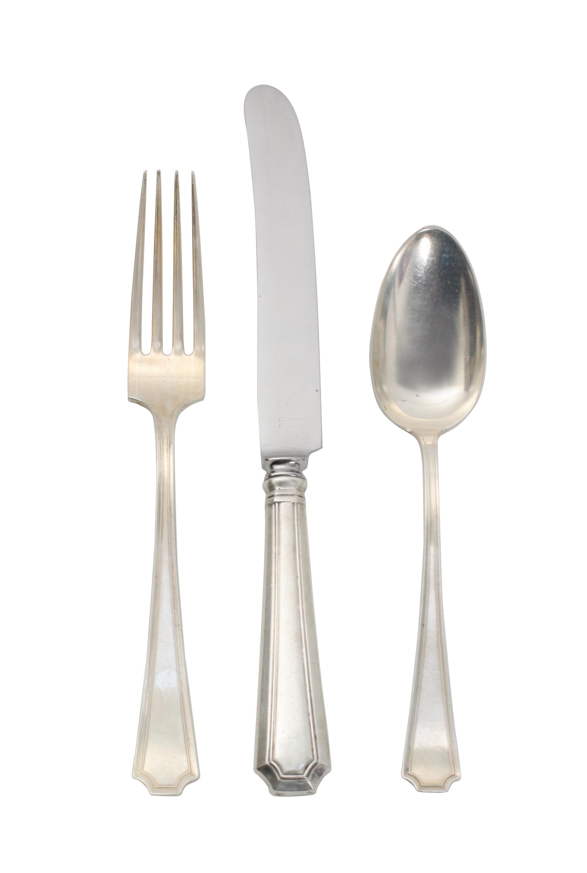 An American Silver Flatware Service, Wm. B. Durgin Co. and Gorham Mfg. Co., comprising: 12 dinner knives 13 dinner forks 12 salad forks