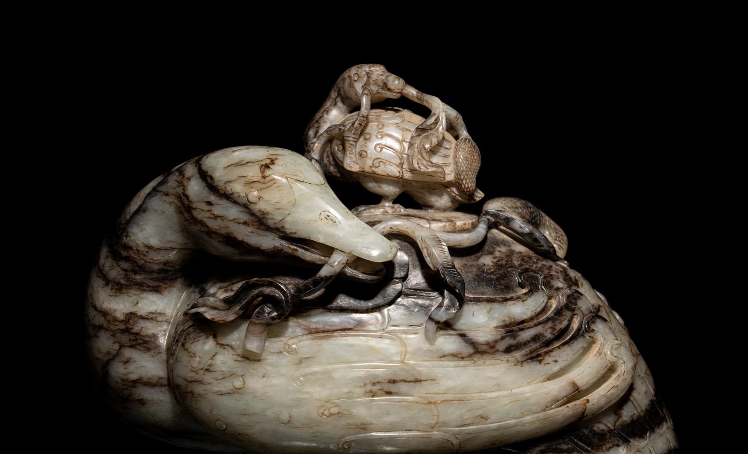 A Chinese Black and White Jade Duck-Form Box and Cover
