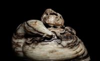A Chinese Black and White Jade Duck-Form Box and Cover