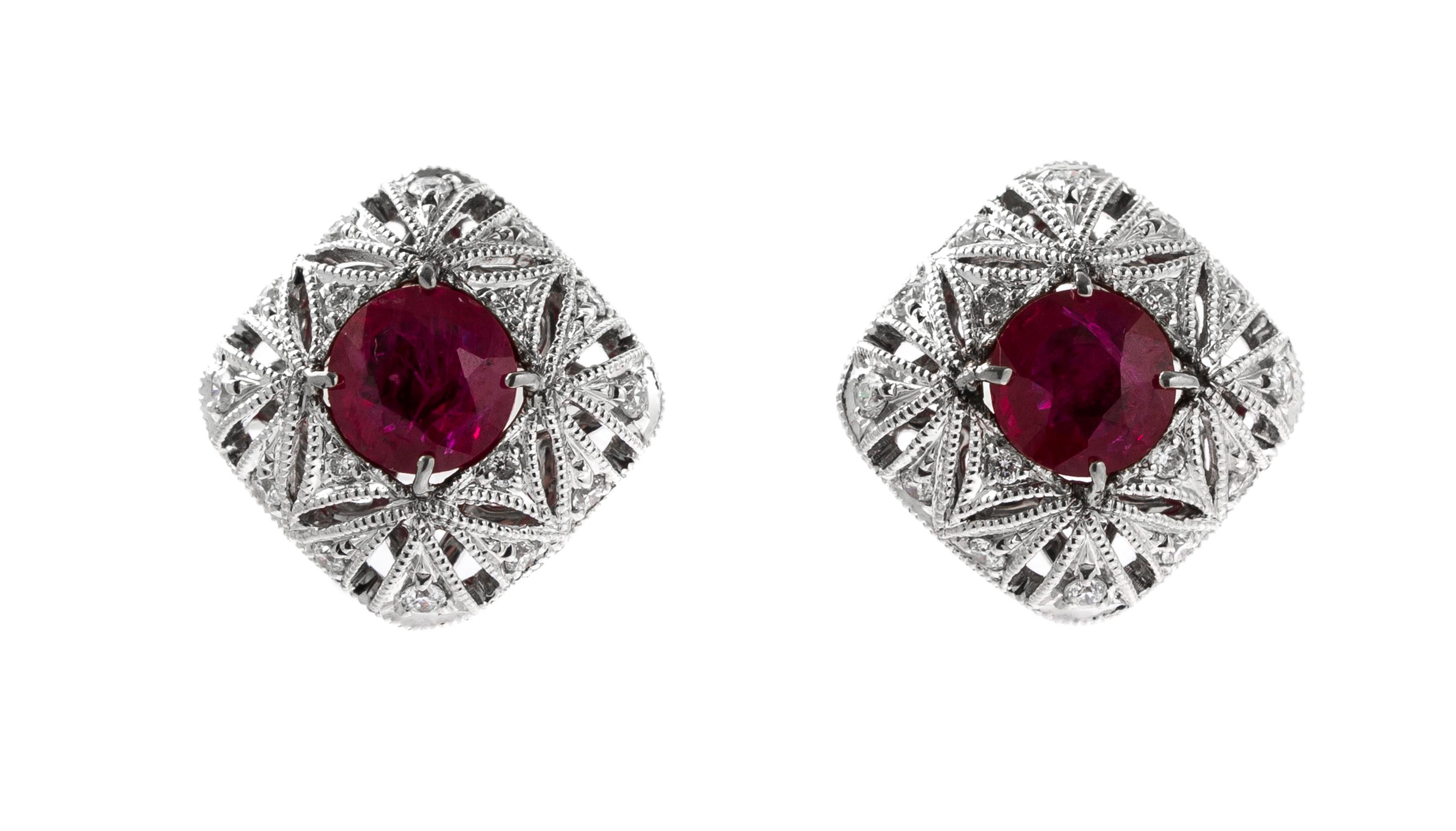 A Pair of 14 Karat White Gold, Ruby and Diamond Earrings, 2.30 dwts.