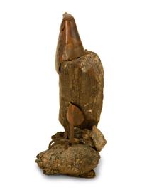 A Natural Stone and Patinated Bronze Figure of an Eagle
