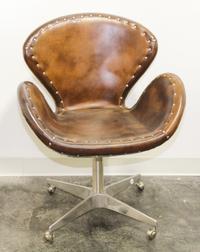 A Riveted Aluminum and Leather Swivel Office Chair, Restoration Hardware Height 34 inches. — 20TH/21ST CENTURY
