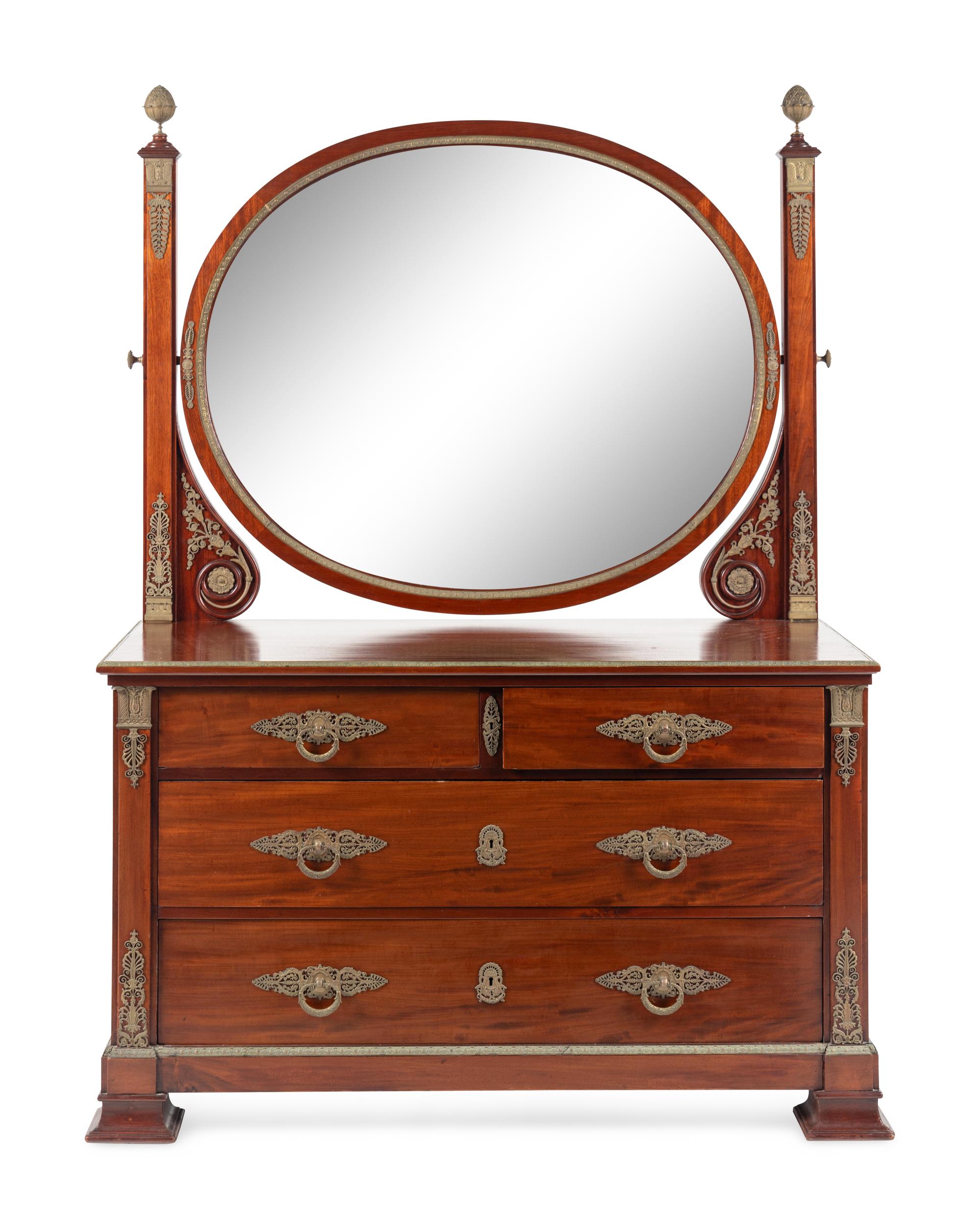 An Empire Style Gilt Bronze Mounted Mahogany Chest of Drawers with Dressing Mirror