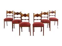 A Set of Six German Parcel Gilt Mahogany Dining Chairs