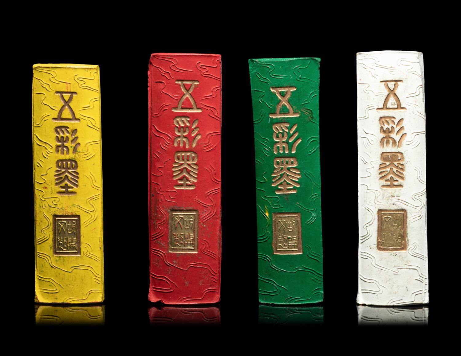 A Set of Four Chinese Polychrome Ink Cakes