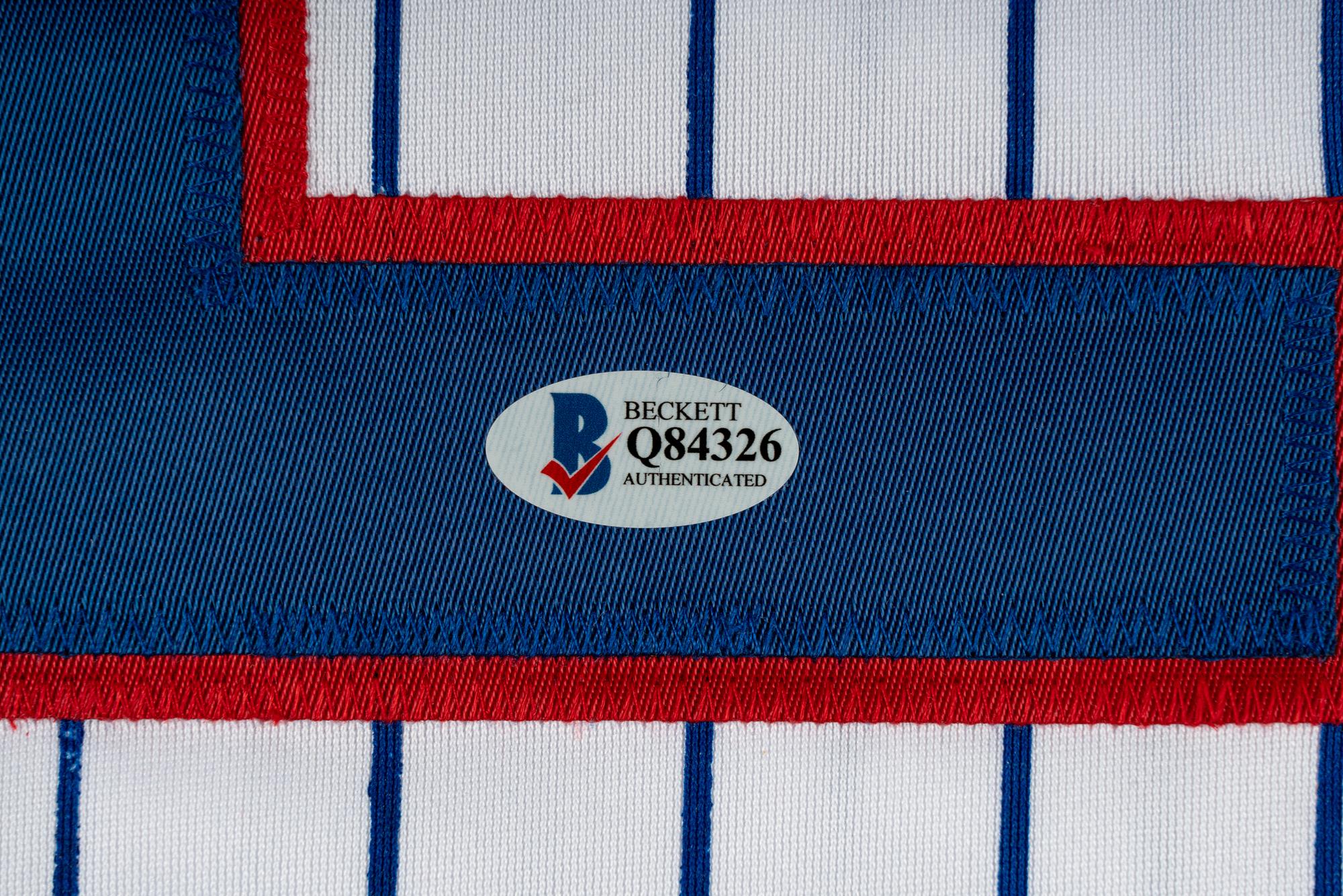 A Large Group of Chicago Cubs Memorabilia Featuring a Signed Kyle Schwarber Jersey