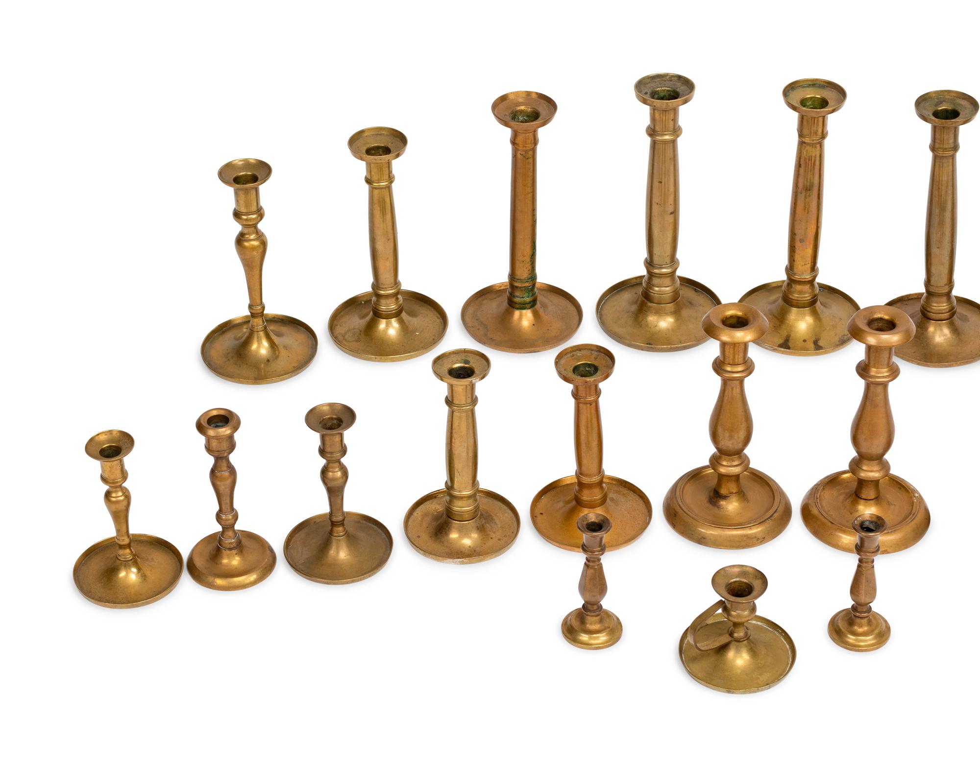 Twenty-Four English Brass Candlesticks
