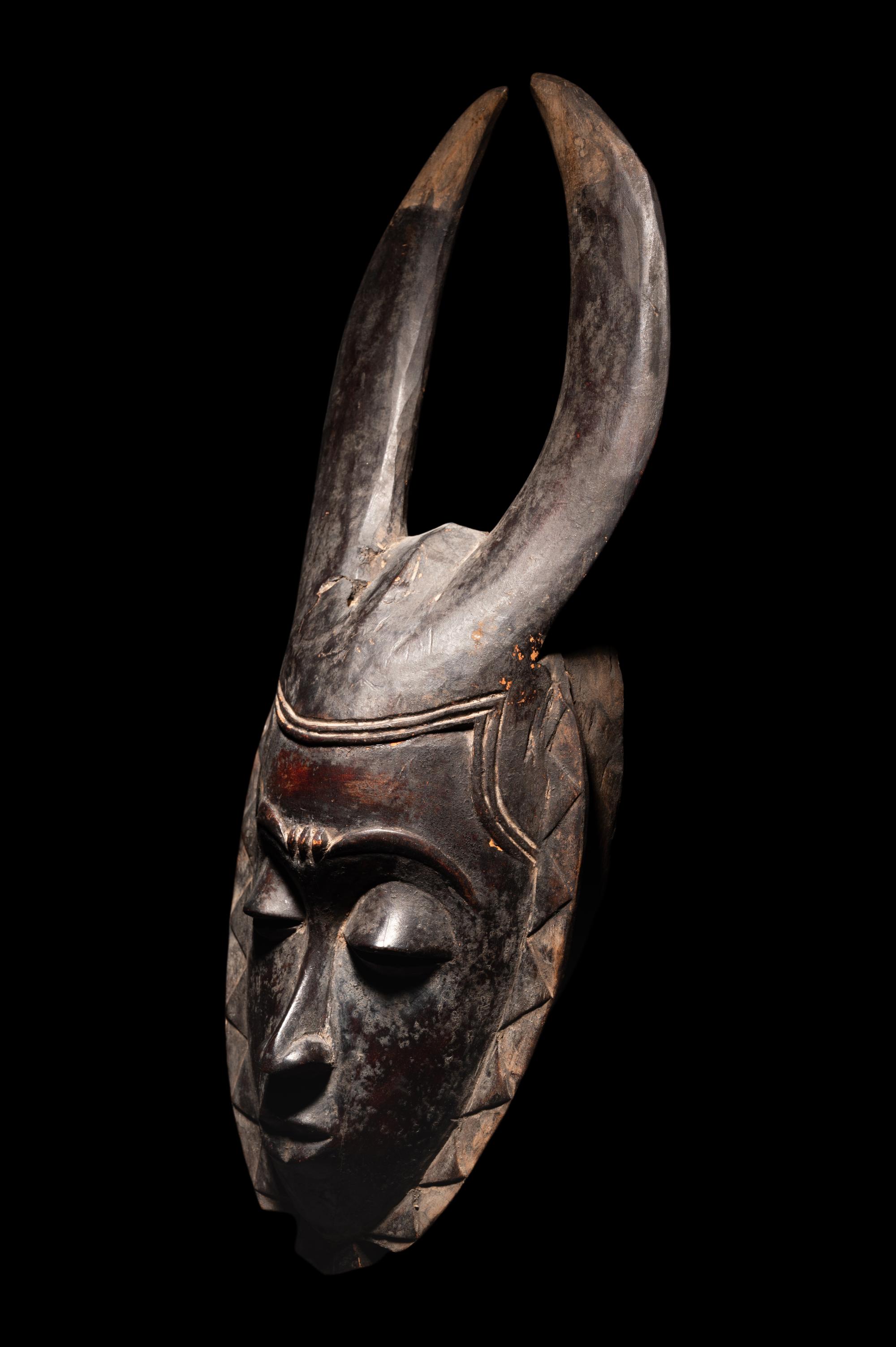 Two Baule Wood Masks