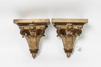 A Pair of Parcel Gilt Wall Brackets Height 10 inches. — 20TH CENTURY