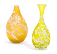 Stevens & Williams, LATE 20TH CENTURY, a cameo glass vase, of bottle form with flared mouth, having floral and butterfly decoration, wi