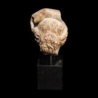A Roman Marble Head of Apollo Lykeios