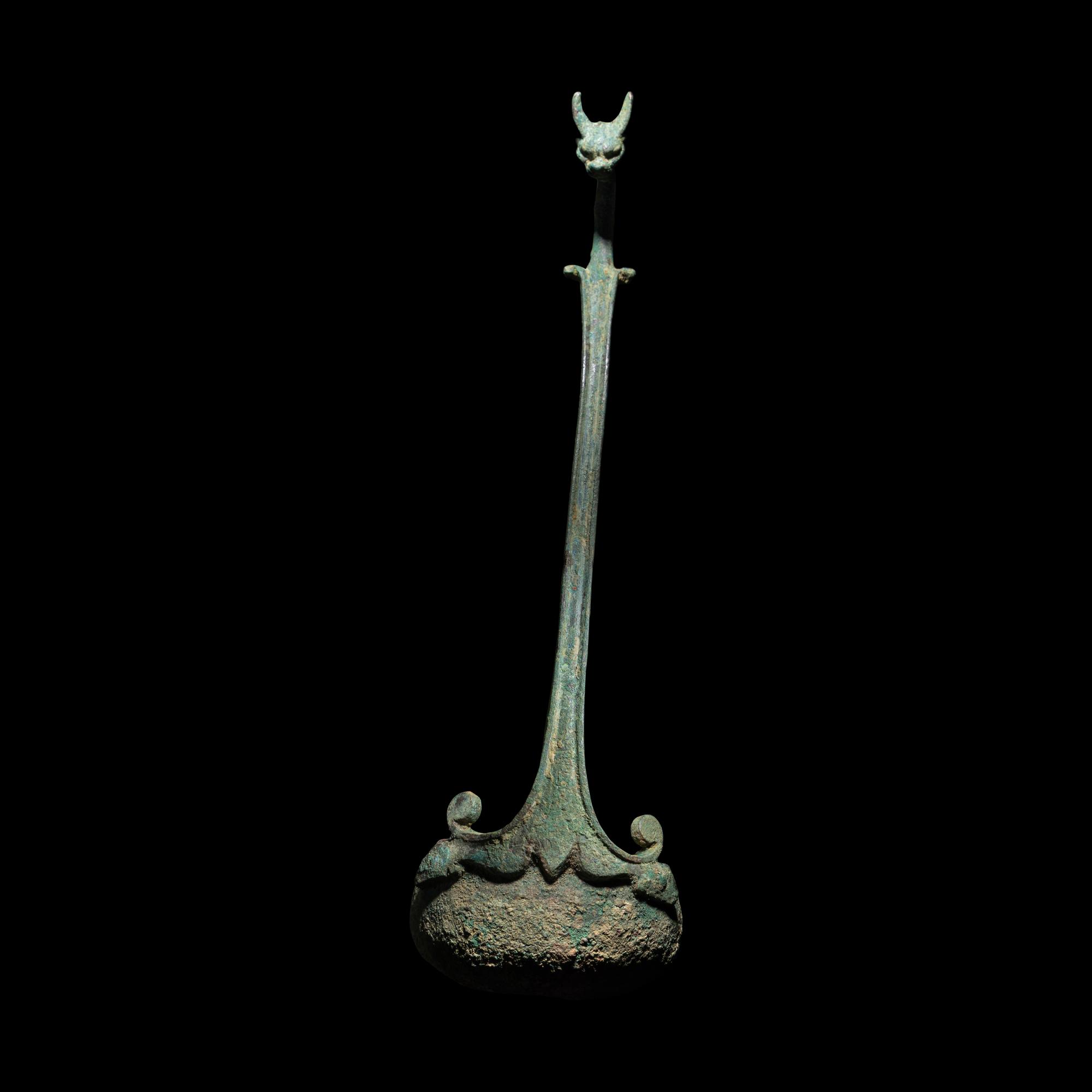 A Roman Bronze Ladle with Panther Handle