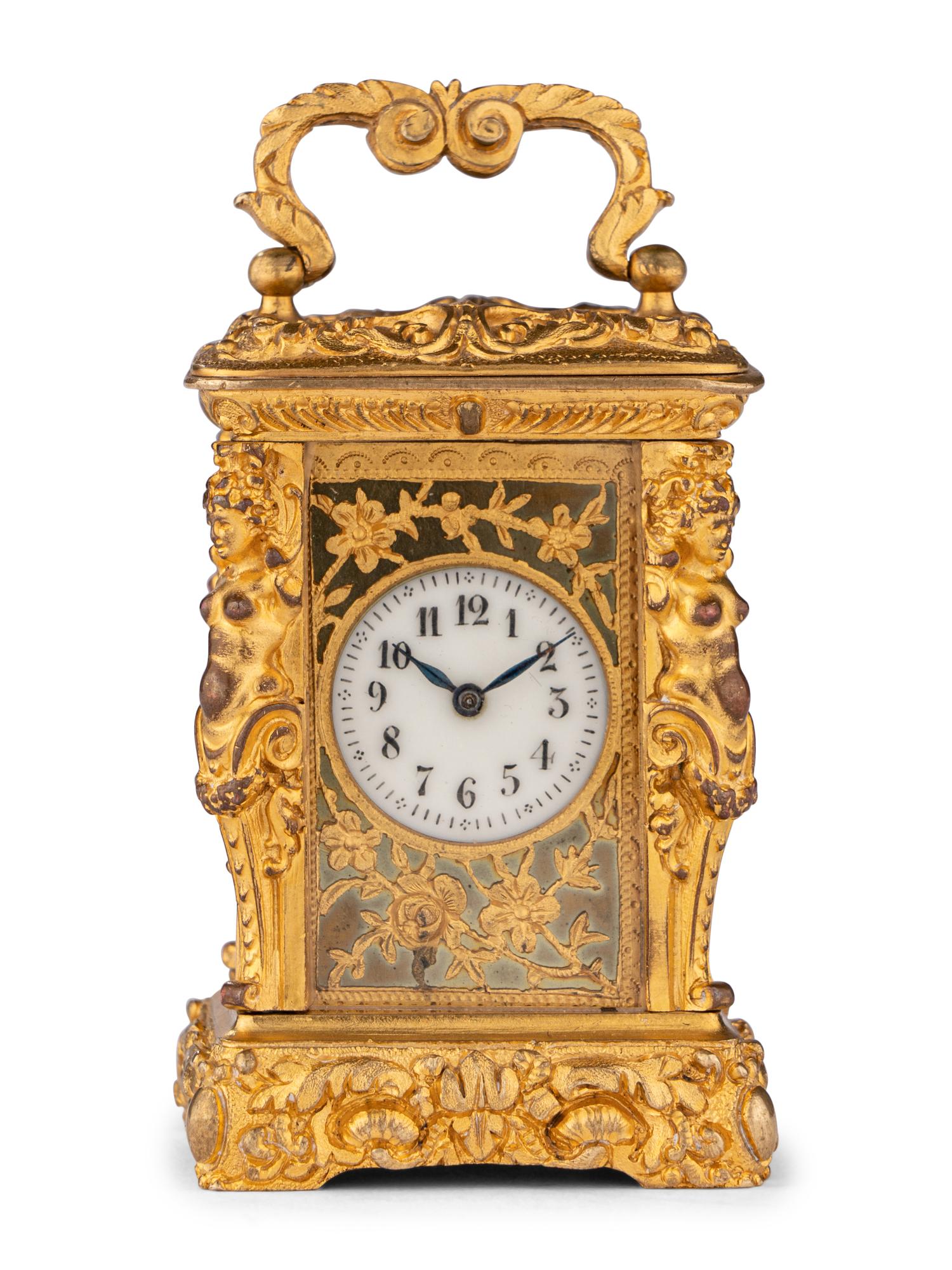 A French Miniature Gilt Bronze Eight-Day Carriage Clock