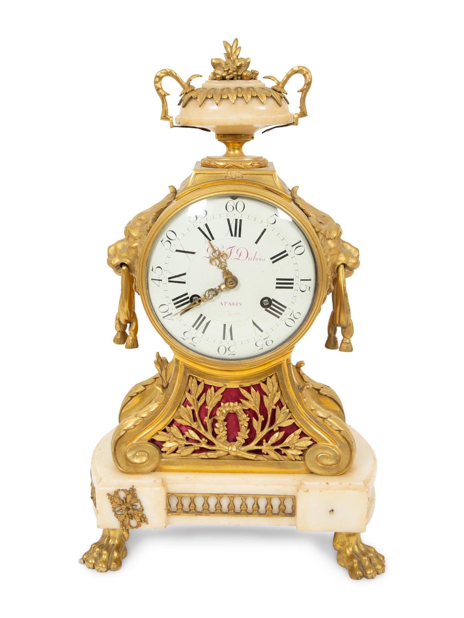 A Louis XVI Gilt Bronze and Marble Mantel Clock