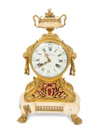 A Louis XVI Gilt Bronze and Marble Mantel Clock