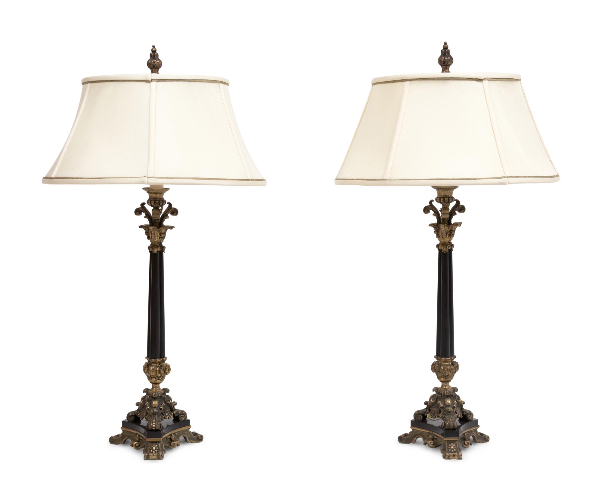 A Pair of Empire Style Gilt and Patinated Bronze Candelabra Mounted as Lamps
