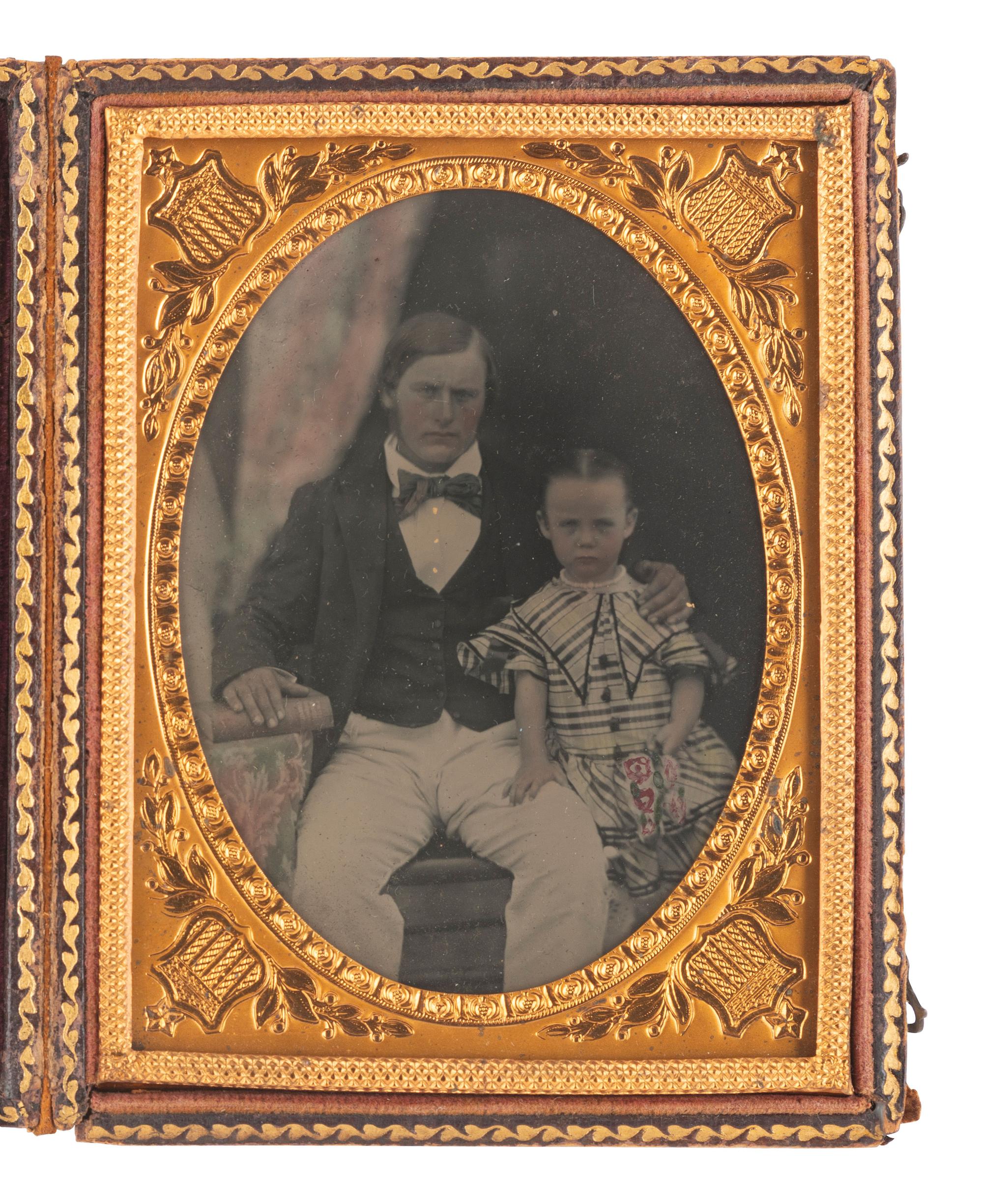 [EARLY PHOTOGRAPHY]. 13 cased images featuring hand tinting.