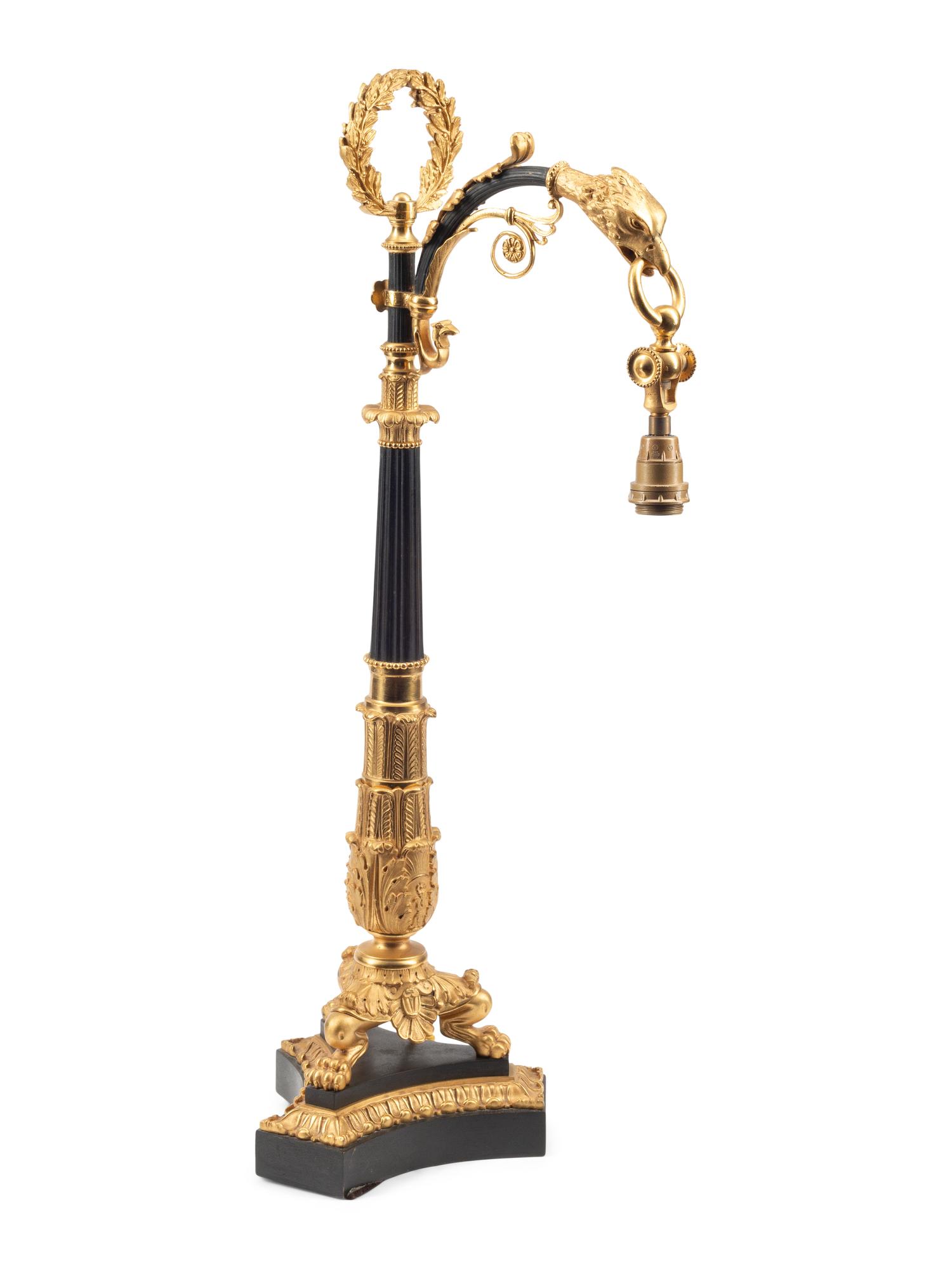 An Empire Gilt and Patinated Bronze Cantilevered Lamp