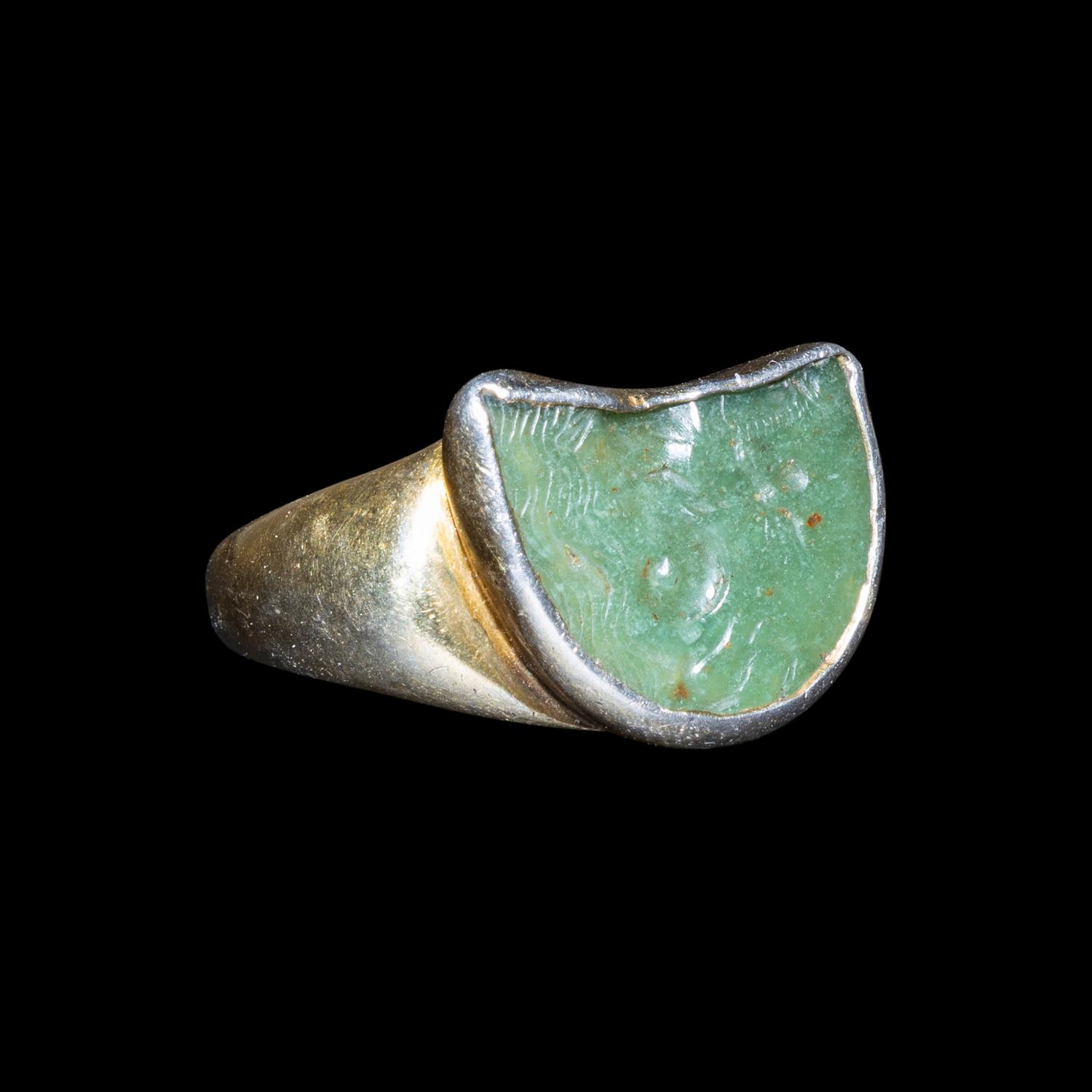 A Roman Prasium Fragmentary Intaglio with Eros on a Seahorse — Set in a 19th century gilt-silver ring