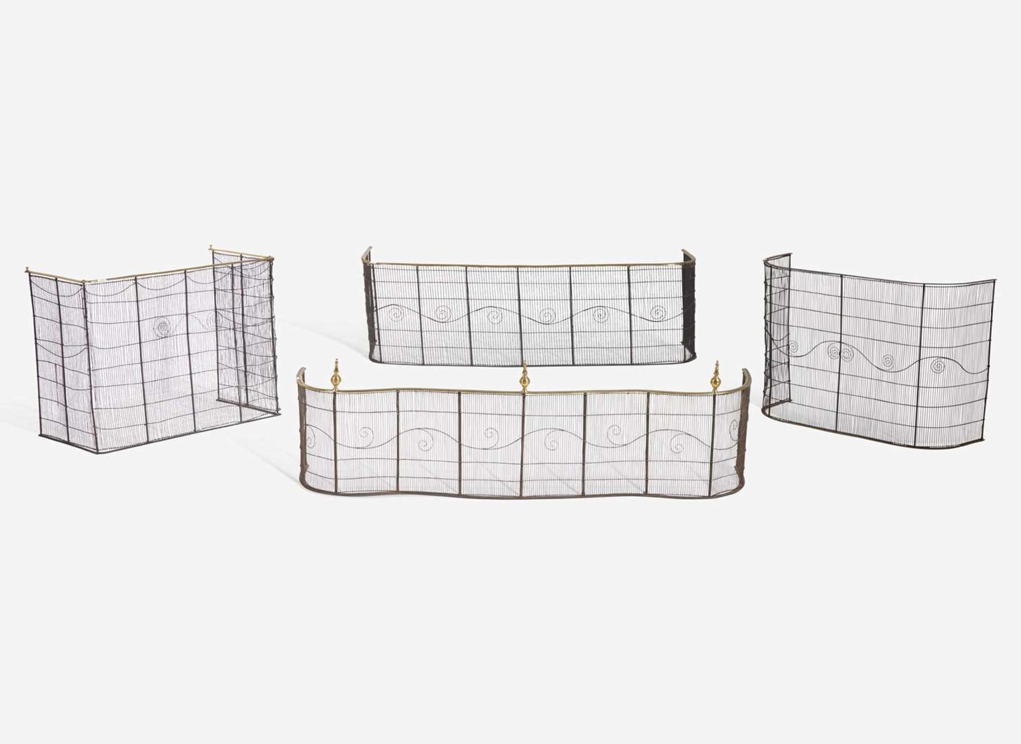 A group of four Federal brass and wirework fireplace screens and fenders, circa 1800