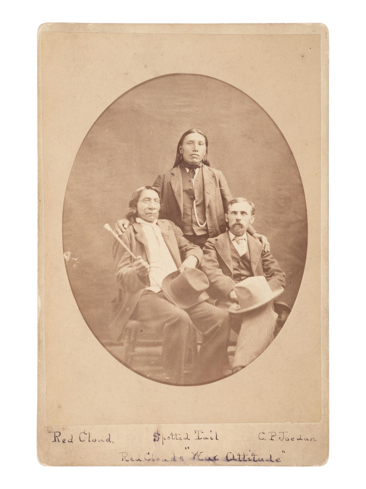 Cabinet card of Red Cloud, Young Spotted Tail, and Charles P. Jordan. Ca 1882.