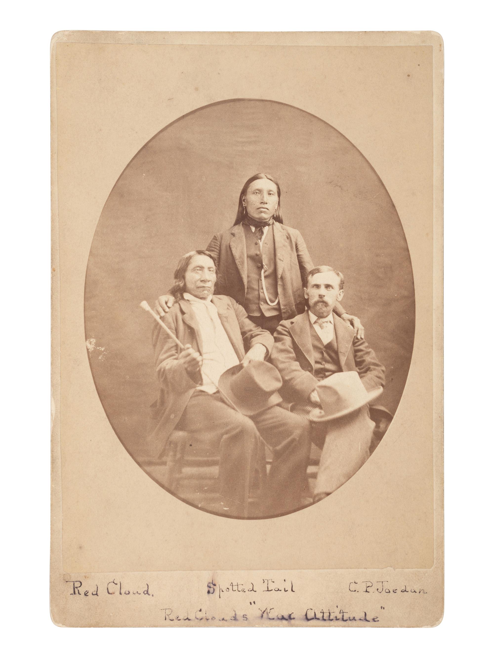 Cabinet card of Red Cloud, Young Spotted Tail, and Charles P. Jordan. Ca 1882.