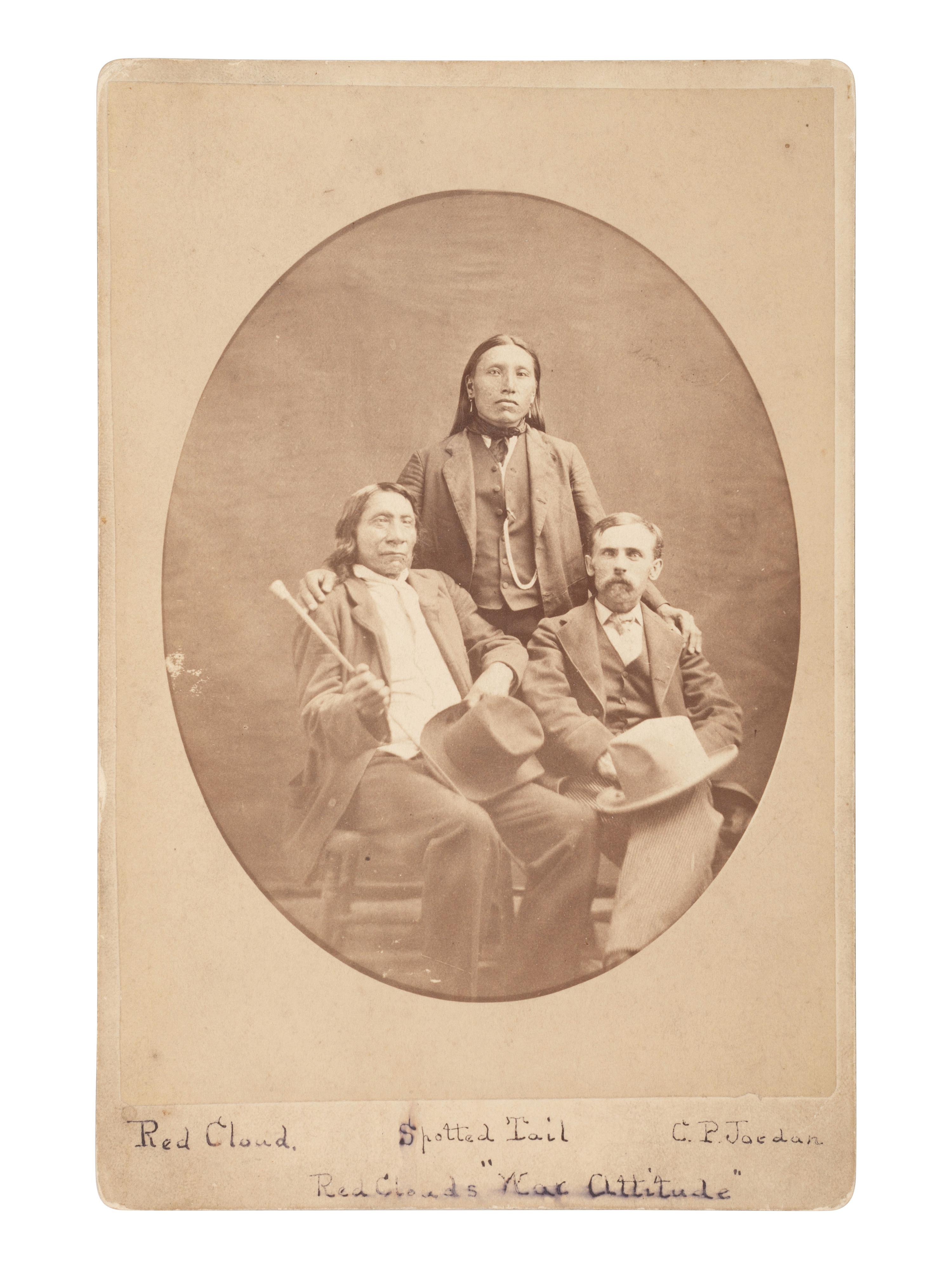 Cabinet card of Red Cloud, Young Spotted Tail, and Charles P. Jordan. Ca 1882.