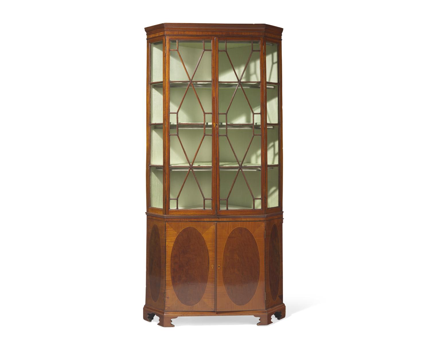 A fine George III inlaid mahogany and satinwood corner cupboard, circa 1790