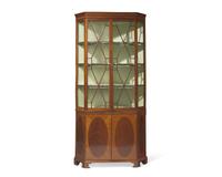 A fine George III inlaid mahogany and satinwood corner cupboard, circa 1790