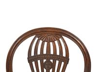 A Set of Four Louis XVI Style Mahogany "Montgolfière" Armchairs