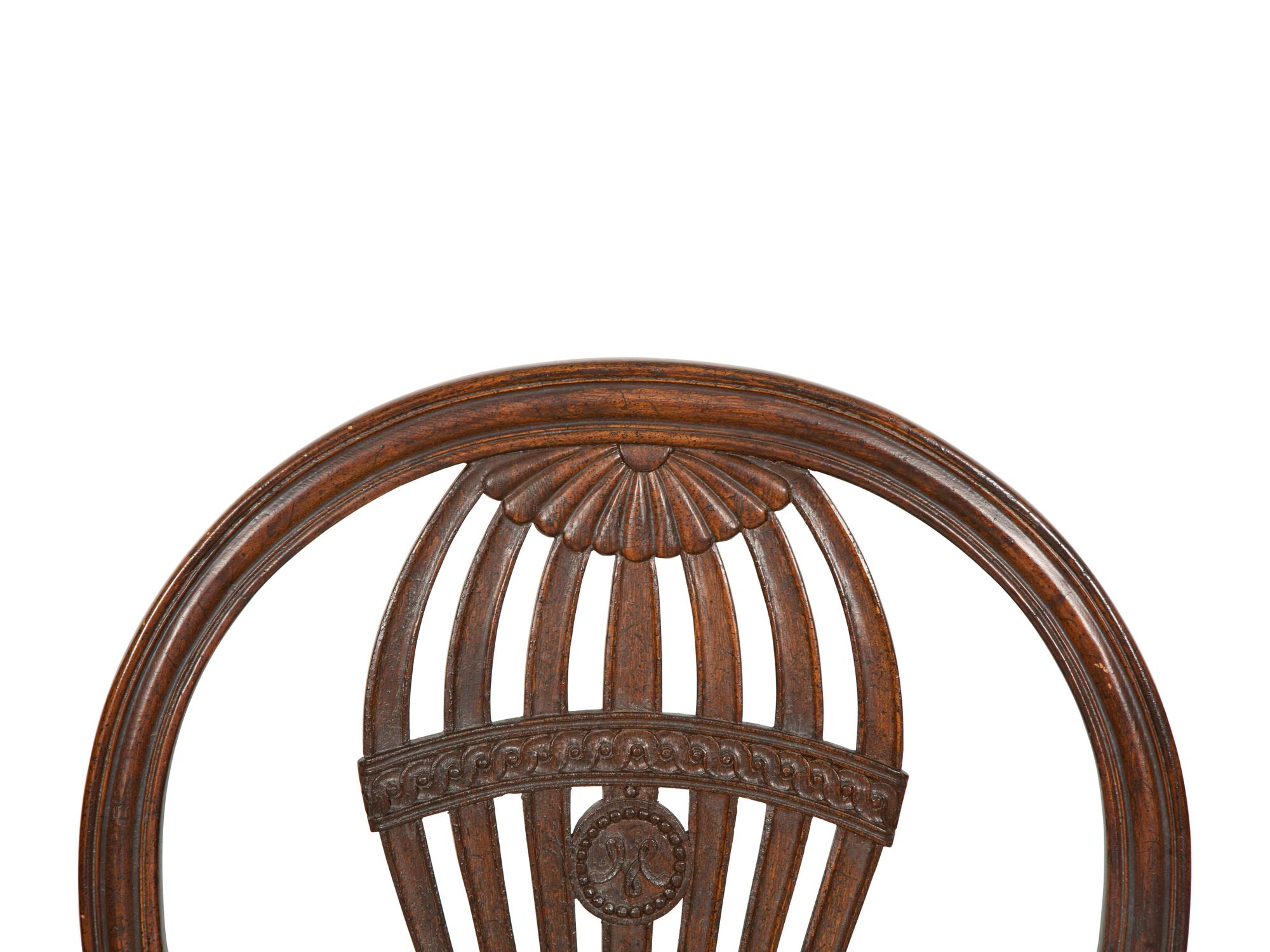 A Set of Four Louis XVI Style Mahogany "Montgolfière" Armchairs